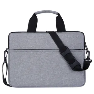 Sacoche fine grise pour ordinateur avec poignées et bandoulière pour ultrabooks