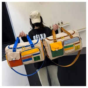 Detail view of large-capacity patchwork travel bags with functional zip pockets