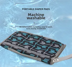 Waterproof portable diaper changing pad with geometric arrow pattern and washable fabric