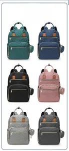 Detailed grid view showing six stylish diaper backpack colors with matching mini coin purses