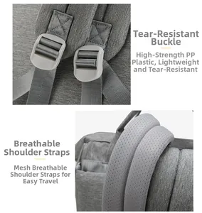 Detail of baby diaper bag showing durable plastic buckle and breathable mesh shoulder straps