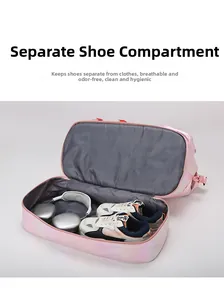 Detail of pink pearlescent gym bag featuring a separate ventilated shoe compartment