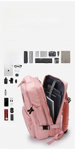 Pink travel backpack showing internal layout for a 17.3 inch laptop and storage