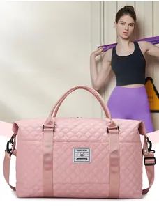 Pink quilted waterproof fitness bag with adjustable shoulder strap and large capacity