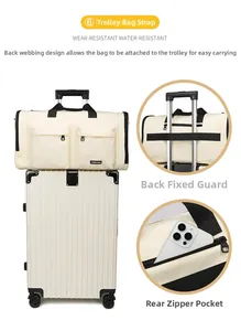 Detail of travel bag back strap for luggage handle and secure zipper phone pocket