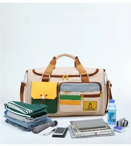 Detailed view of spacious color-block travel bag with organized clothes and daily accessories