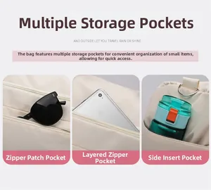 Detail view of large travel bag storage layers, zipper pockets and side compartments