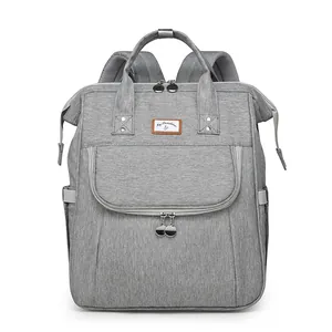 Grey large capacity multi-function diaper backpack with top handles and front zip pocket