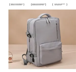 Close-up of gray minimalist backpack showing durable fabric and external USB charging port
