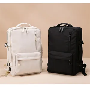 Detailed comparison of black and beige high-capacity travel backpacks with side buckles