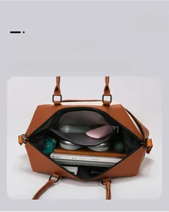 Detail view of spacious travel bag interior showing compartments for tablet and accessories