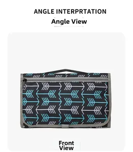 Front view of a portable diaper changing pad with blue arrow patterns and gray top handle