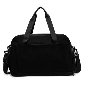 Grand sac de sport noir avec compartiment à chaussures séparé et bandoulière réglable