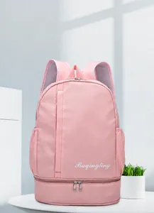 Pink travel bag detail showing the bottom wet-dry separation compartment and durable zippers