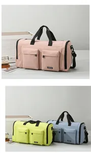 Close-up of multi-pocket travel bags in pink, green and blue with detachable straps