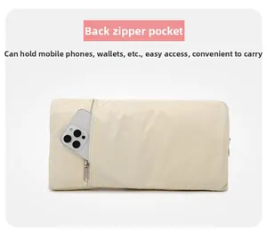Detail showing back zipper pocket for easy access to phone and wallet on travel bag
