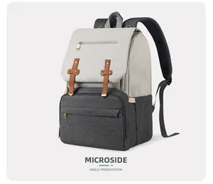 Side view of multi-functional diaper backpack with USB port and gray patchwork design
