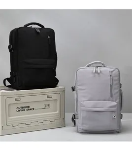 Detailed view of large capacity black and grey commuter backpacks for men and women