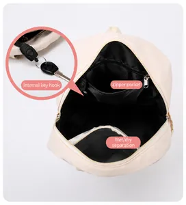 Internal view of travel bag featuring dry-wet separation and key hook for organization
