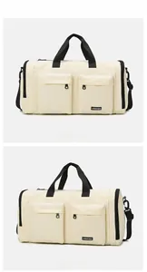 Front and side views of a cream travel bag with black straps and multiple zipper pockets