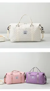 Detailed close-up of quilted nylon travel bags in beige, pink, and purple with straps