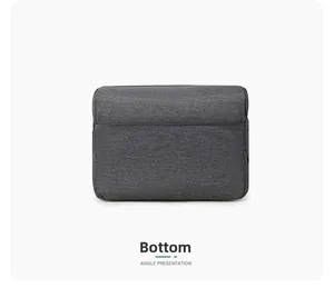 Macro view showing the reinforced flat bottom design of the dark gray diaper bag