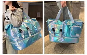 Detailed view of iridescent blue travel bag with separate shoe compartment and buckle pockets
