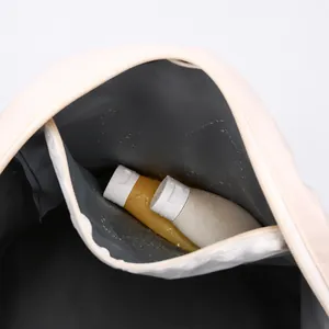 Internal view of travel bag featuring waterproof PVC wet and dry separation compartment
