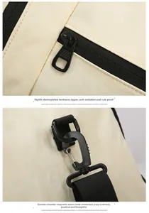 Macro shot of durable black metal zipper and detachable strap hook on off-white fabric