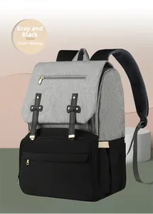 Detail view of the gray and black diaper bag with breathable mesh padded shoulder straps