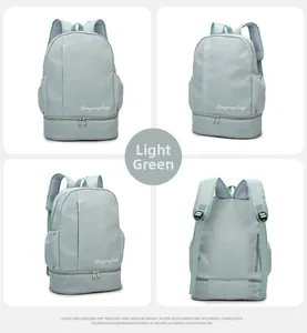 Detail view of light green travel bag showing separate shoe compartment and waterproof fabric
