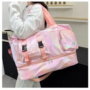 Pink iridescent gym bag featuring waterproof fabric and bottom shoe compartment