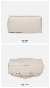 Detailed top and bottom views of the beige waterproof sports travel bag with zippers