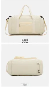Detailed back and bottom view of beige large capacity travel bag with reinforced straps