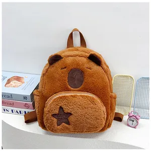 Detail of cute Capybara plush backpack with soft brown fur and embroidered star pocket