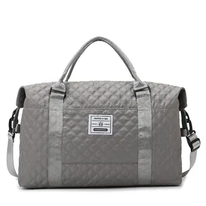 Large grey quilted dry-wet separation travel bag with adjustable strap for gym and yoga