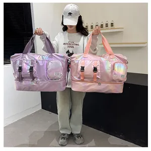 Close-up of holographic waterproof travel bags in purple and pink with multi-pocket detail