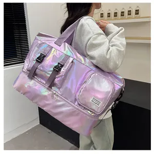 Detail of holographic purple travel bag with waterproof bottom compartment on model