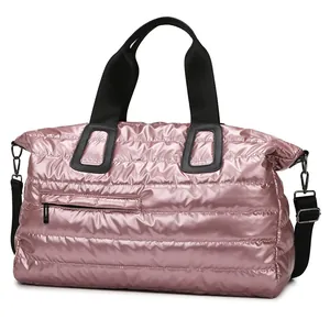 Pink quilted fitness travel bag with waterproof dry wet separation and black straps