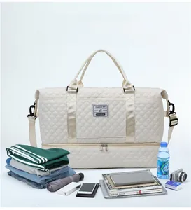 Close-up of quilted travel bag with bottom compartment and organized accessories