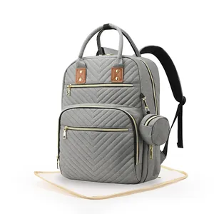 Gray quilted multi-compartment diaper backpack with fold-out thermal storage and changing mat