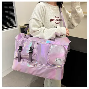Detail view of the holographic purple waterproof travel bag with a separate shoe compartment