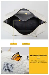 Detailed view of white quilted sports bag with wet and dry separation compartments