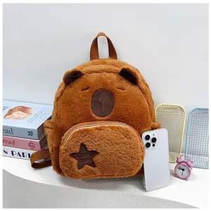 Detailed view of Capybara plush backpack with star embroidery showing relative size