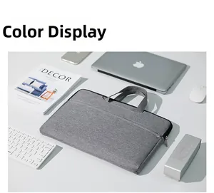 Detail of light gray water-resistant laptop bag with reinforced handle and shockproof interior
