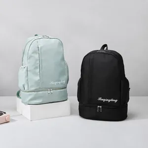 Detail of dry wet separation gym bags with independent shoe compartment in mint and black