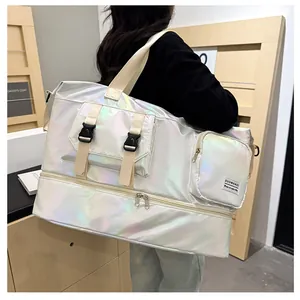 Detail of pearlescent waterproof travel bag showing the iridescent fabric and side pocket