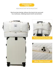 Detail view of the travel bag back strap for luggage handle and hidden zipper pocket