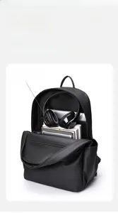 Detail view of the 23L spacious interior and 15.6 inch laptop compartment of this black backpack