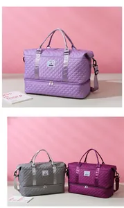 Quilted fitness bag with separate shoe compartment and waterproof fabric texture details